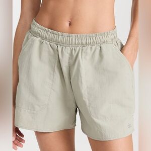 A high-waisted pair of shorts from Alo Yoga SZ-M Limestone color
